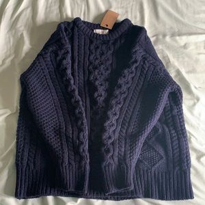 NWT navy knit sweater by the brand OLIVE